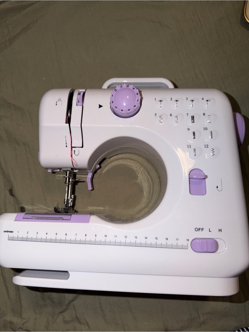 Compact White and Lavender Mini Sewing Machine